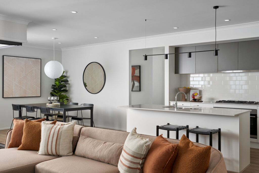 Open-plan living and kitchen area inside the Willow 25 display home at Evergreen Estate by Homebuyers Centre