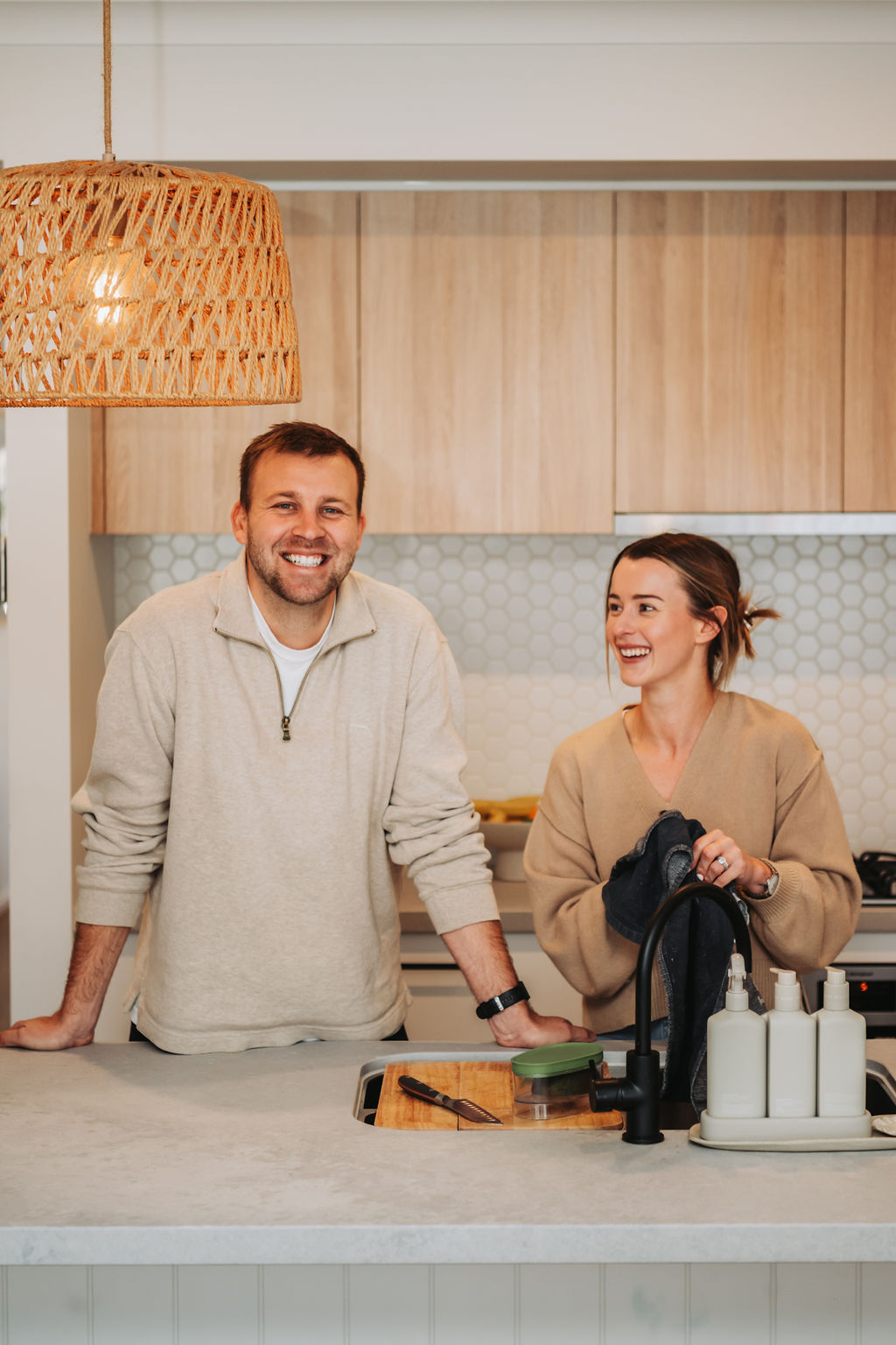 Homebuyers Centre Customers Smiling in their new home.